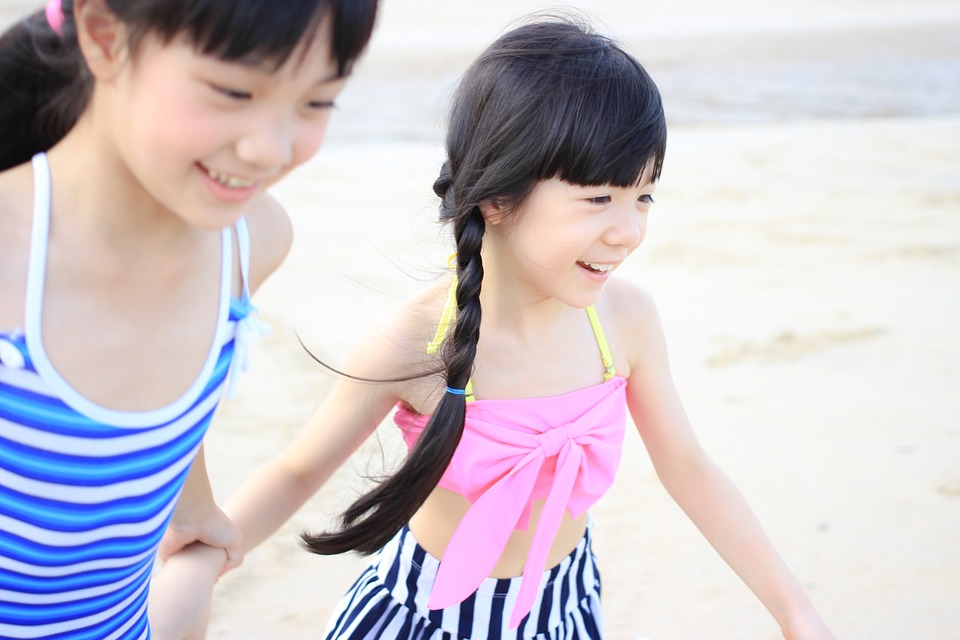 children playing on beach