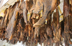meat strips being dried to make biltong